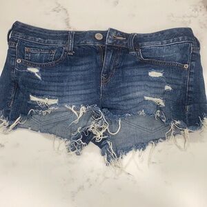 Express distressed jean shorts fringe